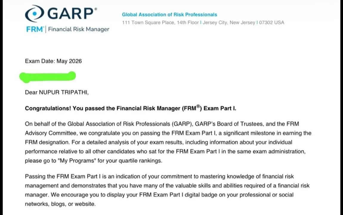 GARP letter confirming Nupur Tripathi passed the FRM Exam Part I in the May 2026 window